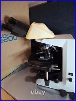 Nikon E200 Microscope with 4 E-plan objectives and binocular head, Halogen lamp