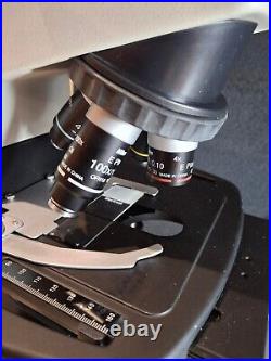 Nikon E200 Microscope with 4 E-plan objectives and binocular head, Halogen lamp