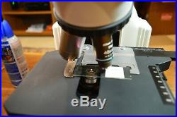 Nikon Eclipse E400 microscope with ergo head and 4 plan objectives